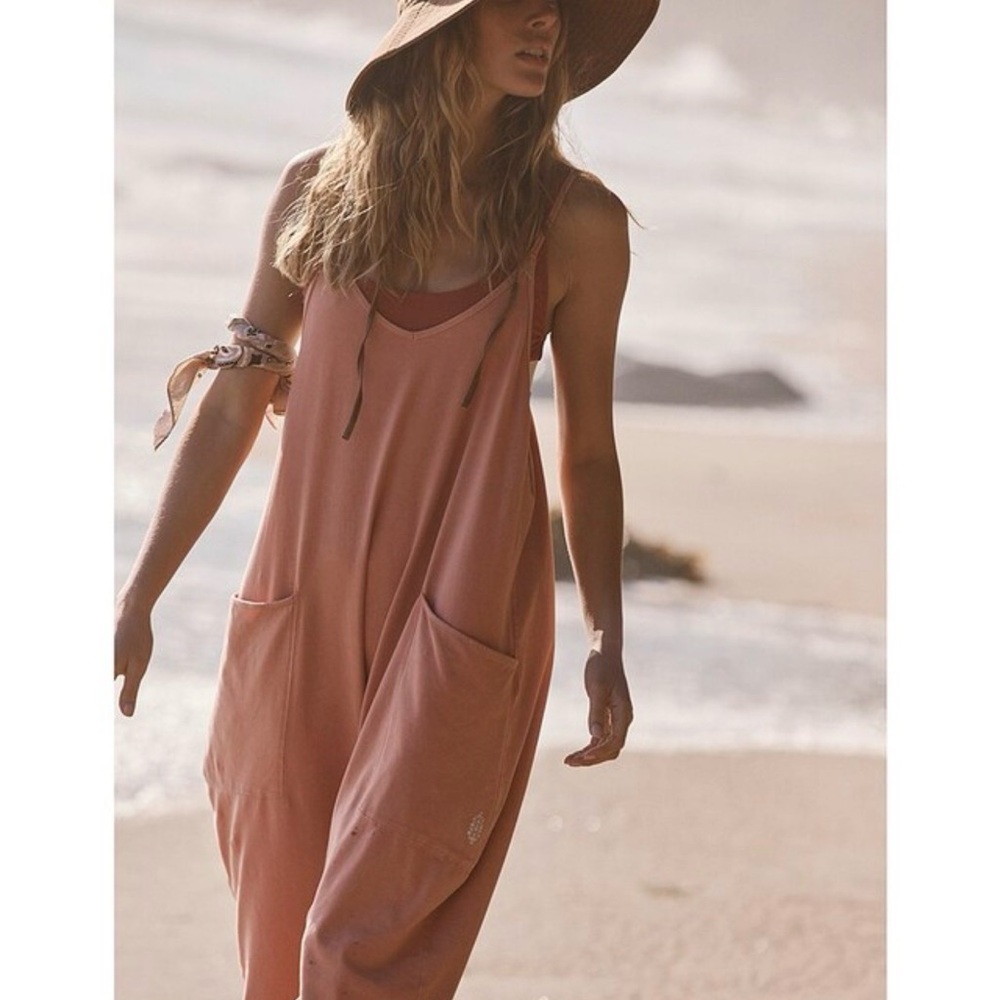 Free people movement hot shot onesie in the color petal xs and small